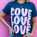 love is in the air graphic tee