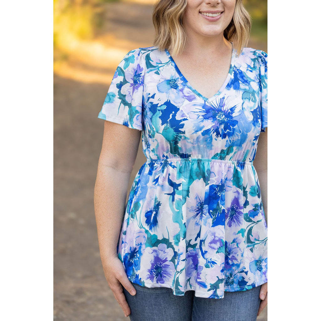 emery blue floral ruffle top womens short sleeve top