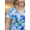 emery blue floral ruffle top womens short sleeve top